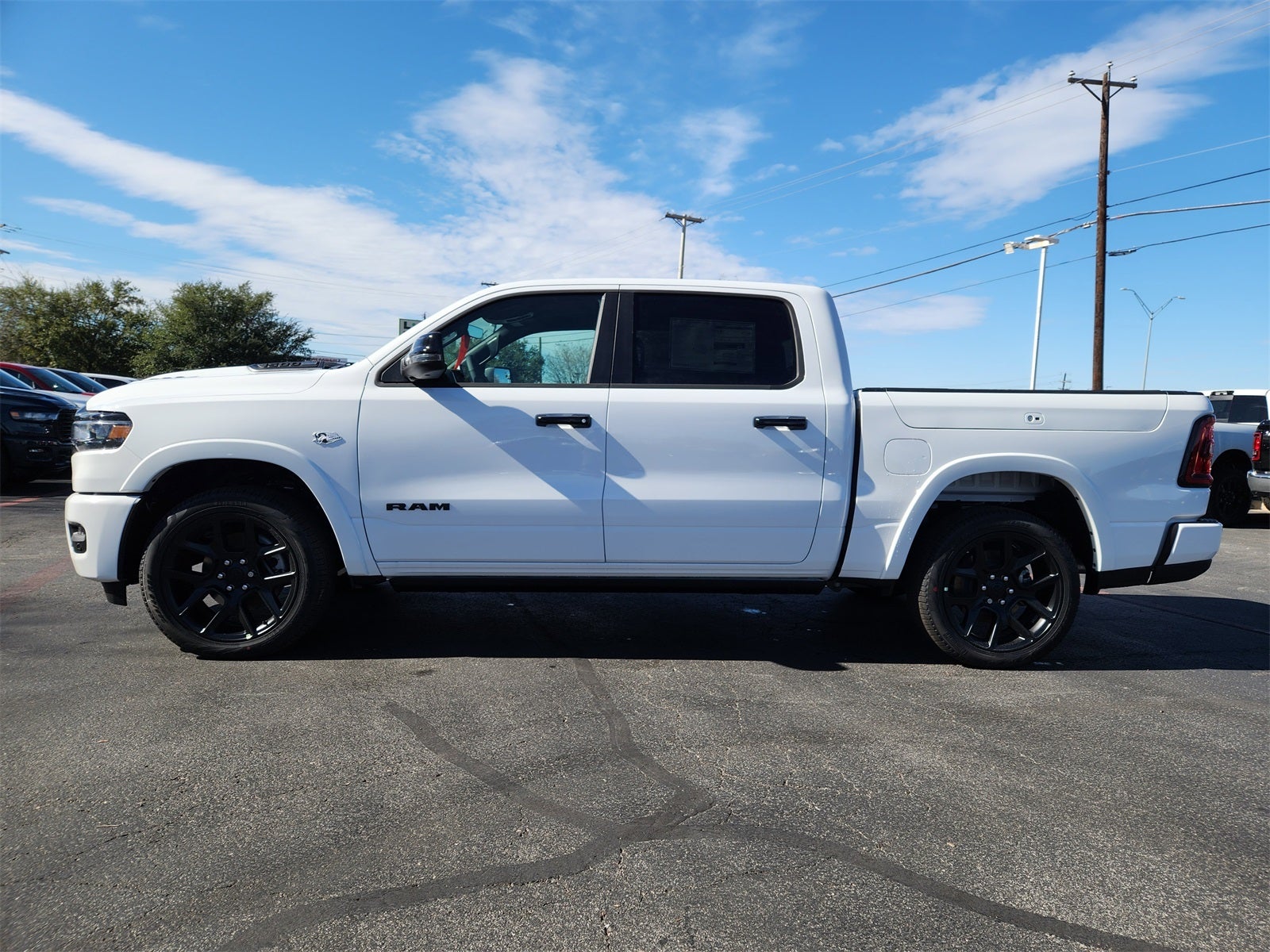 2026 RAM Ram 1500 RAM 1500 LARAMIE CREW CAB 4X4 5'7' BOX
